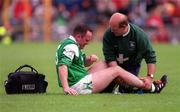 30 May 1999; Tony Collins of Fermanagh is attended to by the Fermangh physio during the Bank of Ireland Ulster Senior Football Championship Preliminary Round match between Monaghan and Fermanagh at St Tiernach's Park in Clones, Monaghan. Photo by Damien Eagers/Sportsfile