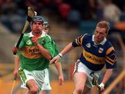 22 May 1999; Willie Joe Leen, Kerry get past Declan Ryan of Tipperary during the Guinness Munster Senior Hurling Championship Quarter-Final match between Tipperary and Kerry at Semple Stadium in Thurles, Tipperary. Photo by Brendan Moran/Sportsfile