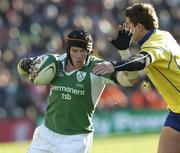 26 November 2005; Johnny O'Connor, Ireland, is tackled by Ionut Dimofte, Romania. permanent tsb International Friendly 2005-2006, Ireland v Romania, Lansdowne Road, Dublin. Picture credit: Brian Lawless / SPORTSFILE
