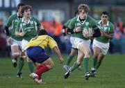 26 November 2005; Andrew Trimble, Ireland, is tackled by Petre Mitu, Romania. permanent tsb International Friendly 2005-2006, Ireland v Romania, Lansdowne Road, Dublin. Picture credit: Brian Lawless / SPORTSFILE