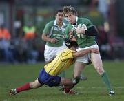 26 November 2005; Andrew Trimble, Ireland, is tackled by Petre Mitu, Romania. permanent tsb International Friendly 2005-2006, Ireland v Romania, Lansdowne Road, Dublin. Picture credit: Brian Lawless / SPORTSFILE