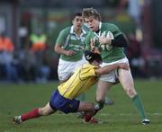 26 November 2005; Andrew Trimble, Ireland, is tackled by Petre Mitu, Romania. permanent tsb International Friendly 2005-2006, Ireland v Romania, Lansdowne Road, Dublin. Picture credit: Brian Lawless / SPORTSFILE