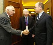 2 December 2005; HSH Prince Albert II of Monaco is greeted by Irish Gold Medallist at the 1956 Olympic Games Ronnie Delany, in the company of Pat Hickey, President of the Olympic Council of Ireland, at the European Olympic Committee General Assembly. Four Season's Hotel, Dublin. Picture credit: Brendan Moran / SPORTSFILE