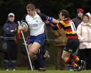 3 December 2005; Andrew O'Brien, Cork Constitution, is tackled by Fiacra Baynes, Lansdowne. AIB All-Ireland League, Lansdowne v Cork Constitution, Lansdowne Road, Dublin. Picture credit: Pat Murphy / SPORTSFILE