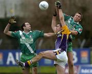 4 December 2005; Darren Magee, Kilmacud Crokes, in action against Sarsfield's pair Alan Barry, right and Dermot Earley. Leinster Club Senior Football Championship Final, Sarsfields v Kilmacud Crokes, Navan, Co. Meath. Picture credit: Damien Eagers / SPORTSFILE