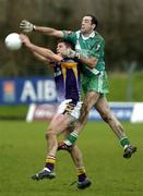 4 December 2005; Dermot Earley, Sarsfield, goes up for a high ball with Darren Magee, Kilmacud Crokes. Leinster Club Senior Football Championship Final, Sarsfields v Kilmacud Crokes, Navan, Co. Meath. Picture credit: Damien Eagers / SPORTSFILE
