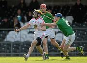 6 April 2014; Conor Grogan, Tyrone, in action against Clement Cunniffe, and Michael Poniard, Leitrim. Allianz Hurling League, 3B Final, Tyrone v Leitrim, Markievicz Park, Sligo. Picture credit: Oliver McVeigh / SPORTSFILE