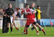 6 April 2014; Carlus McWilliams, Derry, in action against Colm Boyle, Mayo. Allianz Football League, Division 1, Round 7, Mayo v Derry, Elverys MacHale Park, Castlebar, Co. Mayo. Picture credit: Ray Ryan / SPORTSFILE
