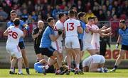 6 April 2014; Referee Marty Duffy calls for order as Dublin and Tyrone players jostle. Allianz Football League, Division 1, Round 7, Tyrone v Dublin, Healy Park, Omagh, Co. Tyrone. Picture credit: Ray McManus / SPORTSFILE
