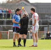 6 April 2014; Referee Marty Duffy issues a yellow card each to Michael Darragh Macauley, Dublin, and Colm Cavanagh, Tyrone. Allianz Football League, Division 1, Round 7, Tyrone v Dublin, Healy Park, Omagh, Co. Tyrone. Picture credit: Ray McManus / SPORTSFILE