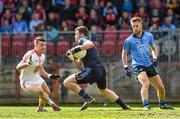 6 April 2014; Dublin goalkeeper Sean Currie, supported by Jonny Cooper, prepares to clear under pressure from Darren McCurry, Tyrone. Allianz Football League, Division 1, Round 7, Tyrone v Dublin, Healy Park, Omagh, Co. Tyrone. Picture credit: Ray McManus / SPORTSFILE