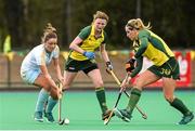 6 April 2014; Gillian Pinder, UCD, in action against Alex Speers, left, and Kate Dillon, Railway Union. Irish Senior Women's Hockey League Final, UCD v Railway Union, Banbridge Hockey Club, Banbridge, Co. Antrim.  Picture credit: Ramsey Cardy / SPORTSFILE