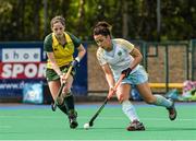 6 April 2014; Anna O'Flannagan, UCD, in action against Emer Lucey, Railway Union. Irish Senior Women's Hockey League Final, UCD v Railway Union, Banbridge Hockey Club, Banbridge, Co. Antrim.  Picture credit: Ramsey Cardy / SPORTSFILE