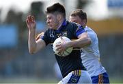 6 April 2014; Donagh Leahy, Tipperary, in action against Dean Healy, Wicklow. Allianz Football League, Division 4, Round 7, Tipperary v Wicklow, Semple Stadium, Thurles, Co. Tipperary. Picture credit: Matt Browne / SPORTSFILE