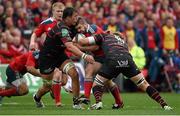 5 April 2014; Duncan Casey, Munster, is tackled by Patricio Albacete, left, and Romain Millo-Chluski, Toulouse. Heineken Cup Quarter-Final, Munster v Toulouse. Thomond Park, Limerick. Picture credit: Diarmuid Greene / SPORTSFILE