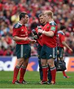 5 April 2014; Munster's Damien Varley, left, in conversation with team-mate John Ryan, alongside head of physiotherapy Anthony Coole, during a break in play. Heineken Cup Quarter-Final, Munster v Toulouse. Thomond Park, Limerick. Picture credit: Diarmuid Greene / SPORTSFILE