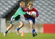 30 November 2005; Albert Martin, Belgrove, in action against Conor Synott, Pope John Paul II. Allianz Cumann na mBunscoil Football Finals, Senior Football Boys Premier Division Final, Belgrove Senior Boys School v Pope John Paul II NS, Croke Park, Dublin. Picture credit: Pat Murphy / SPORTSFILE