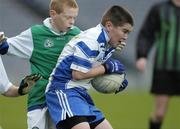 30 November 2005; Conall O'Neill, Gaelscoil Thaobh na Coille, in action against Dylan D'arcy, St. Lawrence O'Tooles. Allianz Cumann na mBunscoil Football Finals, Gaelscoil Thaobh na Coille v St. Lawrence O'Toole NS, Croke Park, Dublin. Picture credit: Pat Murphy / SPORTSFILE