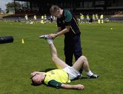 17 October 2005; David Heany is treated by Dr. Con Murphy during a training session in advance of the  Fosters International Rules game between Australia and Ireland,. Claremont, Perth, Western Australia. Picture credit; Ray McManus / SPORTSFILE
