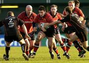 10 December 2005; David Wallace, Munster, is tackled by Richard Fussell, 11, and Steve Jones, 2, Newport Gwent Dragons. Heineken Cup 2005-2006, Pool 1, Munster v Newport Gwent Dragons, Rodney Parade, Newport, Wales. Picture credit: Matt Browne / SPORTSFILE