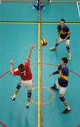 13 December 2005; Dermot McKeon, Drumshambo Vocational School, Leitrim, in action against Fintan Coleman, 10, and Colm Costello, St Louis College, Kiltimagh, Co. Mayo. All-Ireland Colleges Volleyball, Boys Senior A Final, St Louis College, Kiltimagh v Drumshambo Vocational School, Leitrim, UCD, Dublin. Picture credit: Damien Eagers / SPORTSFILE