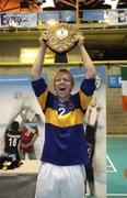 13 December 2005; Jason Gill, St Louis College, Kiltimagh, Mayo lifts the shield after victory. All-Ireland Colleges Volleyball, Boys Senior A Final, St Louis College, Kiltimagh, Mayo v Drumshambo Vocational School, Leitrim, UCD, Dublin. Picture credit: Damien Eagers / SPORTSFILE