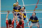 13 December 2005; Joseph McHugh, St Louis College, Kiltimagh, in action against Ciaran Kelly, 15 and Martin Raftery, 5, Drumshambo Vocational School, Leitrim. All-Ireland Colleges Volleyball, Boys Senior A Final, St Louis College, Kiltimagh, Mayo v Drumshambo Vocational School, Leitrim, UCD, Dublin. Picture credit: Damien Eagers / SPORTSFILE