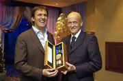 15 December 2005; Former referee Pierluigi Collina who was presented with a personalised bottle of Powers Special Vintage Whiskey by Tony Cascarino at a Legends of Sports Lunch. Burlington Hotel, Dublin. Picture credit: Damien Eagers / SPORTSFILE