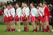 27 November 2005; The An Ghaeltacht players stand for the National Anthem. Munster Club Senior Football Championship Semi-Final, St. Senans Kilkee v An Ghaeltacht, Cooraclare, Co. Clare. Picture credit: Kieran Clancy / SPORTSFILE