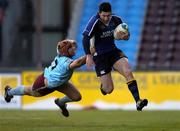 17 December 2005; Rob Kearney, Leinster, is tackled by Augusto Petrilli, Bourgoin. Heineken Cup 2005-2006, Pool 5, Round 4, Bourgoin v Leinster, Stade Pierre Rajon, Bourgoin-Jallieu, France. Picture credit: Brian Lawless / SPORTSFILE