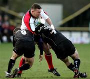 17 December 2005; Justin Fitzpatrick, Ulster, is tackled by Kyran Bracken and Ben Russell, Saracens. Heineken Cup 2005-2006, Pool 4, Round 4, Saracens v Ulster, Vicarage Road, Watford, London, England. Picture credit: Oliver McVeigh / SPORTSFILE