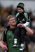 17 December 2005; Connacht captain Andrew Farley is congratulated by 6 year old Cian O'Toole from Corrandulla, Co. Galway. European Challenge Cup 2005-2006, Pool 5, Conancht v Worcester, Sportsground, Galway. Picture credit: Matt Browne / SPORTSFILE