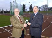 17 December 2005; Christy Brady, left, who was the club captain from 1974 to 1978, is presented with Honorary Life Membership of Clonliffe Harriers by the Paddy Marley , President, Clonliffe Harriers A.C. at a reception in his honour. Cloniffe Harriers A.C, Santry Stadium, Santry, Dublin. Picture credit: Ray McManus / SPORTSFILE