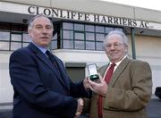 17 December 2005; Christy Brady, left, who was the club captain from 1974 to 1978, is presented with Honorary Life Membership of Clonliffe Harriers by the Paddy Marley , President, Clonliffe Harriers A.C. at a reception in his honour. Cloniffe Harriers A.C, Santry Stadium, Santry, Dublin. Picture credit: Ray McManus / SPORTSFILE