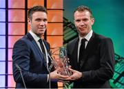 2 March 2014; Malachy McDermott, Cockhill Celtic FC, Buncrana, Co. Donegal, is presented with the Intermediate player of the year award by Republic of Ireland International Glenn Whelan. Three FAI International Football Awards, RTE Studios, Donnybrook, Dublin. Picture credit: David Maher / SPORTSFILE