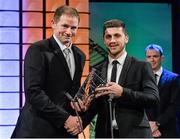 2 March 2014; Noel O'Donnell, Irish Deaf Football team, is presented with the Football for all International player of the year award by Republic of Ireland International Shane Long. Three FAI International Football Awards, RTE Studios, Donnybrook, Dublin. Picture credit: David Maher / SPORTSFILE