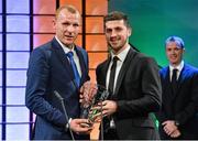 2 March 2014; Paul Breen, St. Michael's FC, Tipperary Town, Co. Tipperary, is presented with the Junior International player of the year award by Republic of Ireland International Shane Long. Three FAI International Football Awards, RTE Studios, Donnybrook, Dublin. Picture credit: David Maher / SPORTSFILE