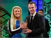 2 March 2014; Savannah McCarthy, Listowel Celtic, Co. Kerry, is presented with the U.17 Women's International player of the year award by Republic of Ireland International Glenn Whelan. Three FAI International Football Awards, RTE Studios, Donnybrook, Dublin. Picture credit: David Maher / SPORTSFILE