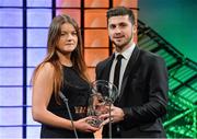 2 March 2014; Clare Shine, from Cork and playing for Raheny United, is presented with the U.19 Women's International  player of the year award by Republic of Ireland International Shane Long. Three FAI International Football Awards, RTE Studios, Donnybrook, Dublin. Picture credit: David Maher / SPORTSFILE