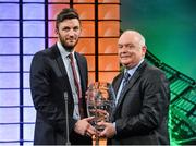 2 March 2014; Killian Brennan, St.Patrick's Athletic, is presented with the Airtricity League Player of the Year award by FAI president Paddy McCaul. Three FAI International Football Awards, RTE Studios, Donnybrook, Dublin. Picture credit: David Maher / SPORTSFILE