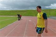 8 April 2014; Munster's Felix Jones makes his way out for squad training ahead of their Celtic League 2013/14, Round 19, game against Glasgow Warriors on Saturday. Munster Rugby Squad Training, University of Limerick, Limerick. Picture credit: Diarmuid Greene / SPORTSFILE