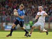 6 April 2014; Eoghan O'Gara, Dublin, in action against Danny McBride, Tyrone. Allianz Football League, Division 1, Round 7, Tyrone v Dublin, Healy Park, Omagh, Co. Tyrone. Picture credit: Ray McManus / SPORTSFILE