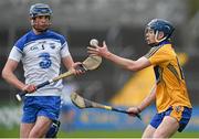9 April 2014; Darren Chaplin, Clare, in action against  Conor Prunty, Waterford. Electric Ireland Munster GAA Hurling Minor Championship, Quarter-Final, Clare v Waterford, Cusack Park, Ennis, Co. Clare. Picture credit: Diarmuid Greene / SPORTSFILE