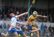 9 April 2014; Eddie Hayden, left, and Darragh Lyons, Waterford, in action against Aaron Shanagher, Clare. Electric Ireland Munster GAA Hurling Minor Championship, Quarter-Final, Clare v Waterford, Cusack Park, Ennis, Co. Clare. Picture credit: Diarmuid Greene / SPORTSFILE