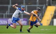 9 April 2014; Brian Guilfoyle, Clare, in action against Conor Prunty, Waterford. Electric Ireland Munster GAA Hurling Minor Championship, Quarter-Final, Clare v Waterford, Cusack Park, Ennis, Co. Clare. Picture credit: Diarmuid Greene / SPORTSFILE