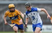 9 April 2014; Sean Hogan, Waterford, in action against Jason McCarthy, Clare. Electric Ireland Munster GAA Hurling Minor Championship, Quarter-Final, Clare v Waterford, Cusack Park, Ennis, Co. Clare. Picture credit: Diarmuid Greene / SPORTSFILE