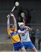 9 April 2014; Ian Galvin, Clare, in action against Shane Bennett, Waterford. Electric Ireland Munster GAA Hurling Minor Championship, Quarter-Final, Clare v Waterford, Cusack Park, Ennis, Co. Clare. Picture credit: Diarmuid Greene / SPORTSFILE