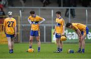 9 April 2014; Clare players react after defeat to Waterford. Electric Ireland Munster GAA Hurling Minor Championship, Quarter-Final, Clare v Waterford, Cusack Park, Ennis, Co. Clare. Picture credit: Diarmuid Greene / SPORTSFILE