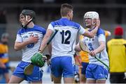 9 April 2014; Waterford players, from left to right, Sean Hogan, Shane Ryan and Peter Hogan celebrate after victory over Clare. Electric Ireland Munster GAA Hurling Minor Championship, Quarter-Final, Clare v Waterford, Cusack Park, Ennis, Co. Clare. Picture credit: Diarmuid Greene / SPORTSFILE