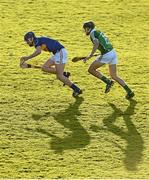 10 April 2014; Jack Skehan, Tipperary, in action against Colin Ryan, Limerick. Electric Ireland Munster GAA Hurling Minor Championship, Quarter-Final, Limerick v Tipperary. Gaelic Grounds, Limerick. Picture credit: Diarmuid Greene / SPORTSFILE